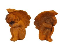 Coppia di fermalibri putti in