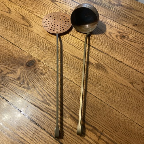 Antico colino mestolo utensili