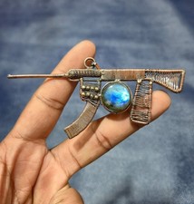 Ciondolo a forma di fucile AK