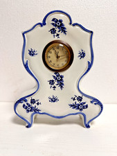 Antico orologio in porcellana