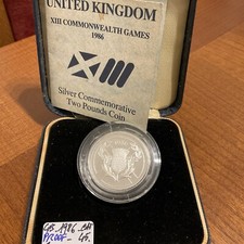 MONETA DA DUE STERLINE A PROVA DI ARGENTO 1986 + SCATOLA & CERTIFICATO. GIOCHI 