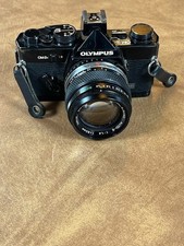Olympus OM-2n reflex 35mm con