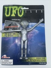 UFO File Grigio Rapitore Alieno Pieghevole con Bagliore negli Occhi Oscuri Giocattolo Concetti