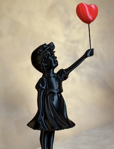 Statua palloncino ragazza