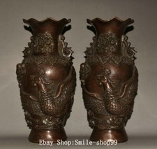 Coppia vasi bottiglia fiori