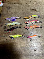 15 Artificiali per calamari nuovi + 12 artificiali jig, gommati e cucchiani