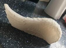 Stampo in lattice per realizzare questa candela ad ala d'angelo