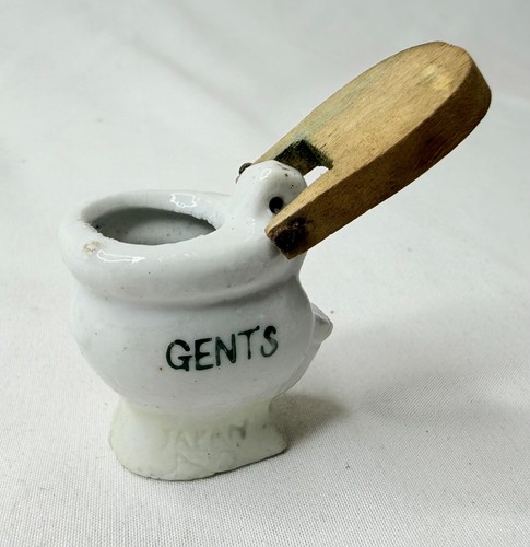 Piccola statuina toilette