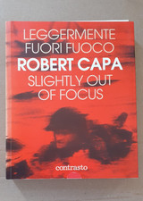 LEGGERMENTE FUORI FUOCO.  Robert Capa. Contrasto 2002
