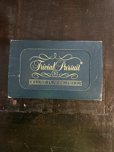 Trivial pursuit deluxe playing - trivial,