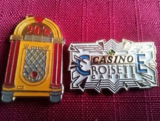 Pin's Lot De 2 Pins 1 Casino Canne (Croisette) 1 Juke Box Signé Winston (53)
