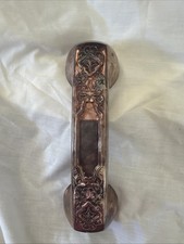 Antico copri maniglia telefono