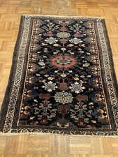 Antico tappeto persiano antico