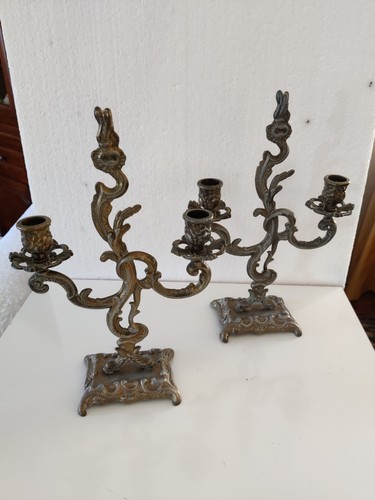 Coppia candelabri in - di,