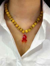 Collana di perle con ciondolo