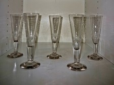 cinque flutes da champagne vetro finito alla mola della prima meta' dell 800.