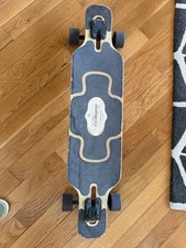 Longboard Caricato Tan Tien