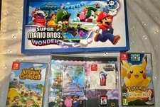 Mario Wonder Box + Let’s Go Pikachu + Animal Crossing + Mew VMAX – Switch Lotto
