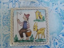 Vecchia piastrella di ceramica