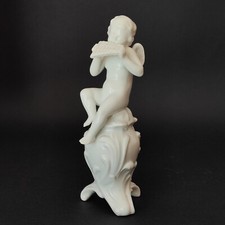 Figurine - Puttino player with