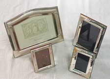 Lotto di n. 4 cornici laminate argento di varie misure usate