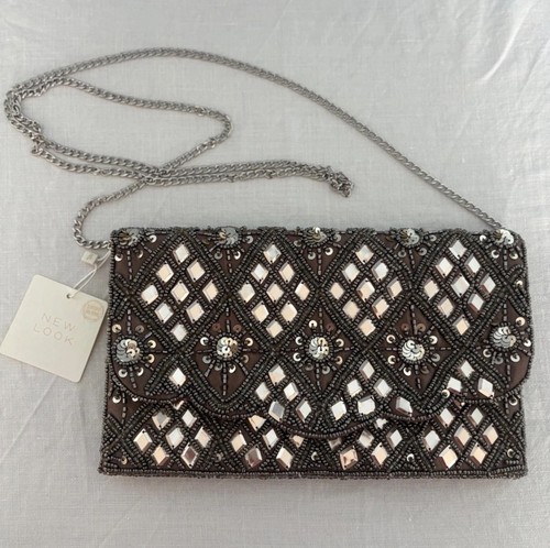 Pochette sera new - da, look