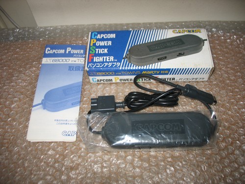 Boxed adapter capcom power - adapter,