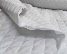 TESSUTO TRAPUNTATO COTONE DOUBLE FACE FANTASIA TINTA UNITA BIMBO AL MEZZO METRO