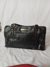 Pure Luxuries Black Leather