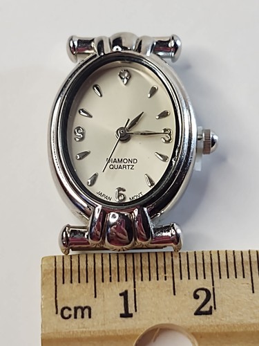 Testa orologio ovale quarzo - testa,