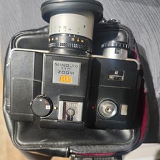 MINOLTA 110 ZOOM SLR CAMERA