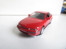 GAMA 1:43 1138 OPEL CALIBRA, 3 porte, rosso!!!