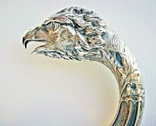 Bastone - Fusto in Legno - Imp. in Argento sbalzato: testa di rapace  - fine 800