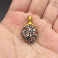 Ciondolo dorato design linea