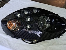 Alfa Romeo 4C coppia fari anteriori carbonio Bi LED NUOVI 50529986 50529989
