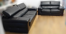 Coppia di divani in ecopelle nera – 2 e 3 posti