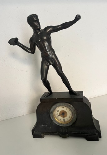 Orologio scultura lanciatore