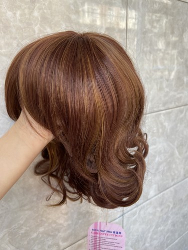 Parrucche capelli sintetici