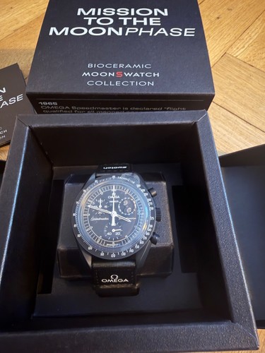Swatch omega bioceramic - x,