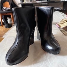 Autentici stivaletti con zeppa