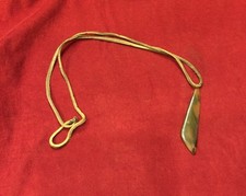 Collana bigiotteria etnica - Triangolo plastica ambrata - Laccio in cuoio