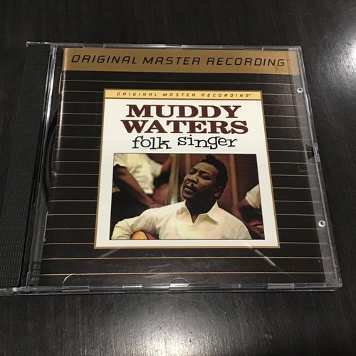 Folk singer muddy waters - by,