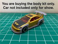 Kit carrozzeria larga 1/64 per