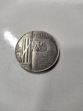 Riproduzione moneta Lire 20