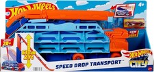 Camion Hot Wheels Bisarca Autotrasportatore a Caduta Libera con Pista da 60 Cm