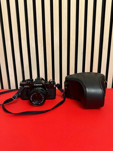 Canon nera con obiettivo - canon,