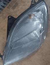 1320349 Proiettore SX FORD FIESTA (CBK) 1.4 TDCi Ghia Ber. 3p/d/1399cc