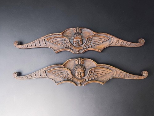 Coppia teste putti - teste,