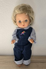 Simpatica bambola in vinile