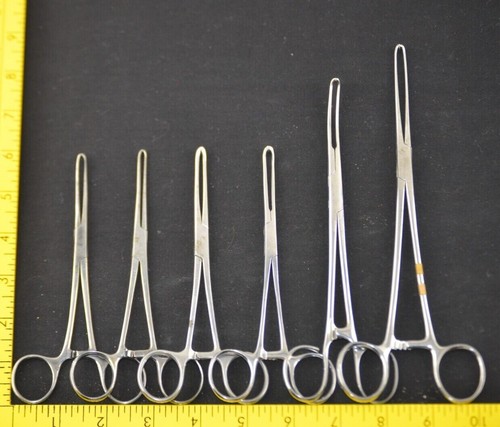 Pinza per tessuti - , trazione